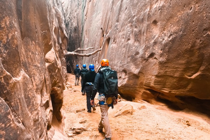 a man walking down a dirt road